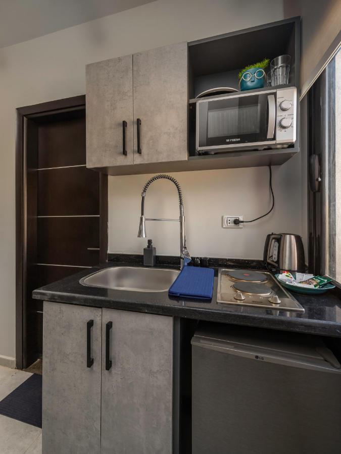 Travelholic Residence Golden Gates Kairo Bagian luar foto