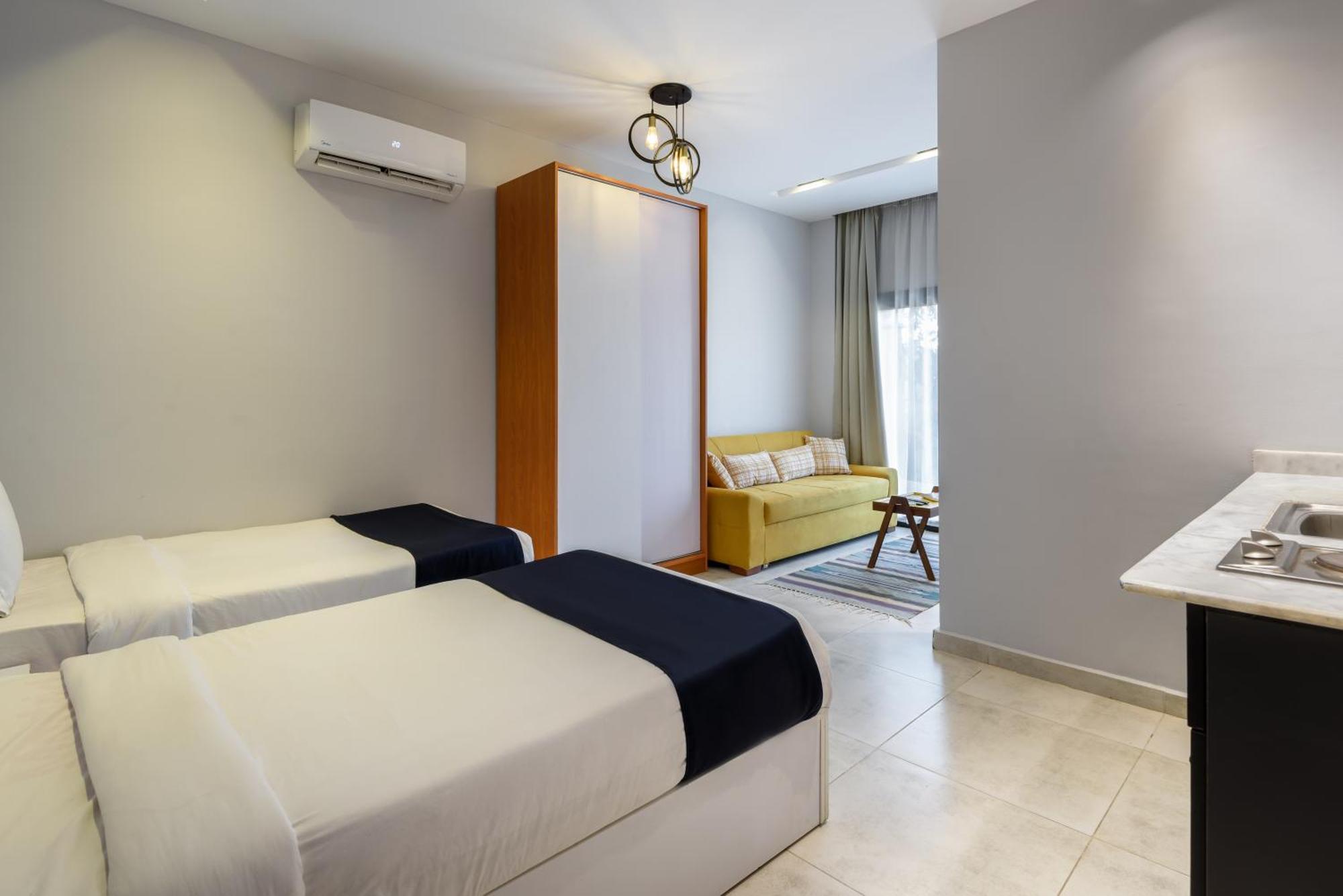 Travelholic Residence Golden Gates Kairo Bagian luar foto